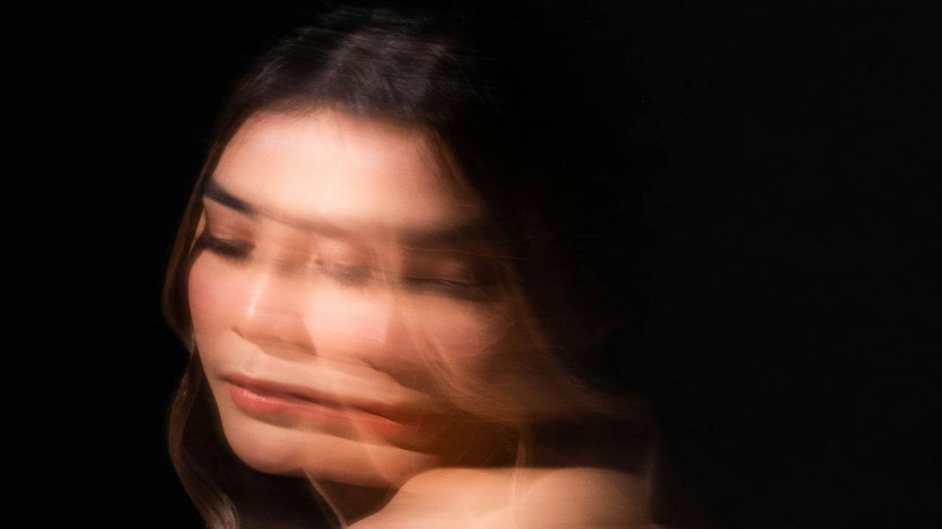 Dark, spacious room with subtle light, perfect for focused movement.